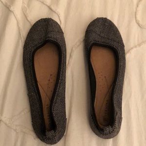 Black and gray patterned flats, size 10